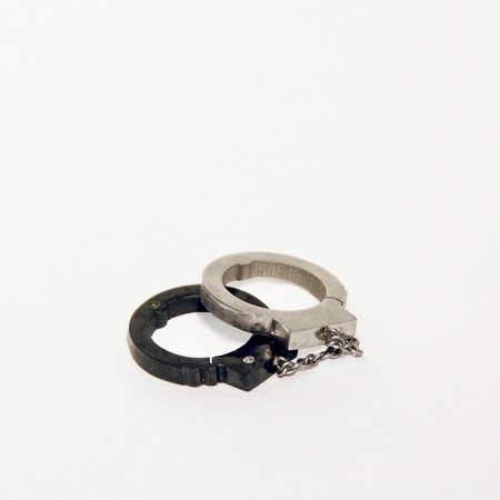 Donated item: Pendant with steel handcuffs