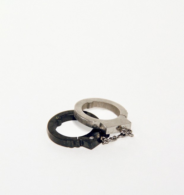 Donated item: Pendant with steel handcuffs